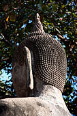 Ayutthaya, Thailand. Wat Mahathat, detail of a Buddha image of a small vihara near the eastern side of the eclosure.